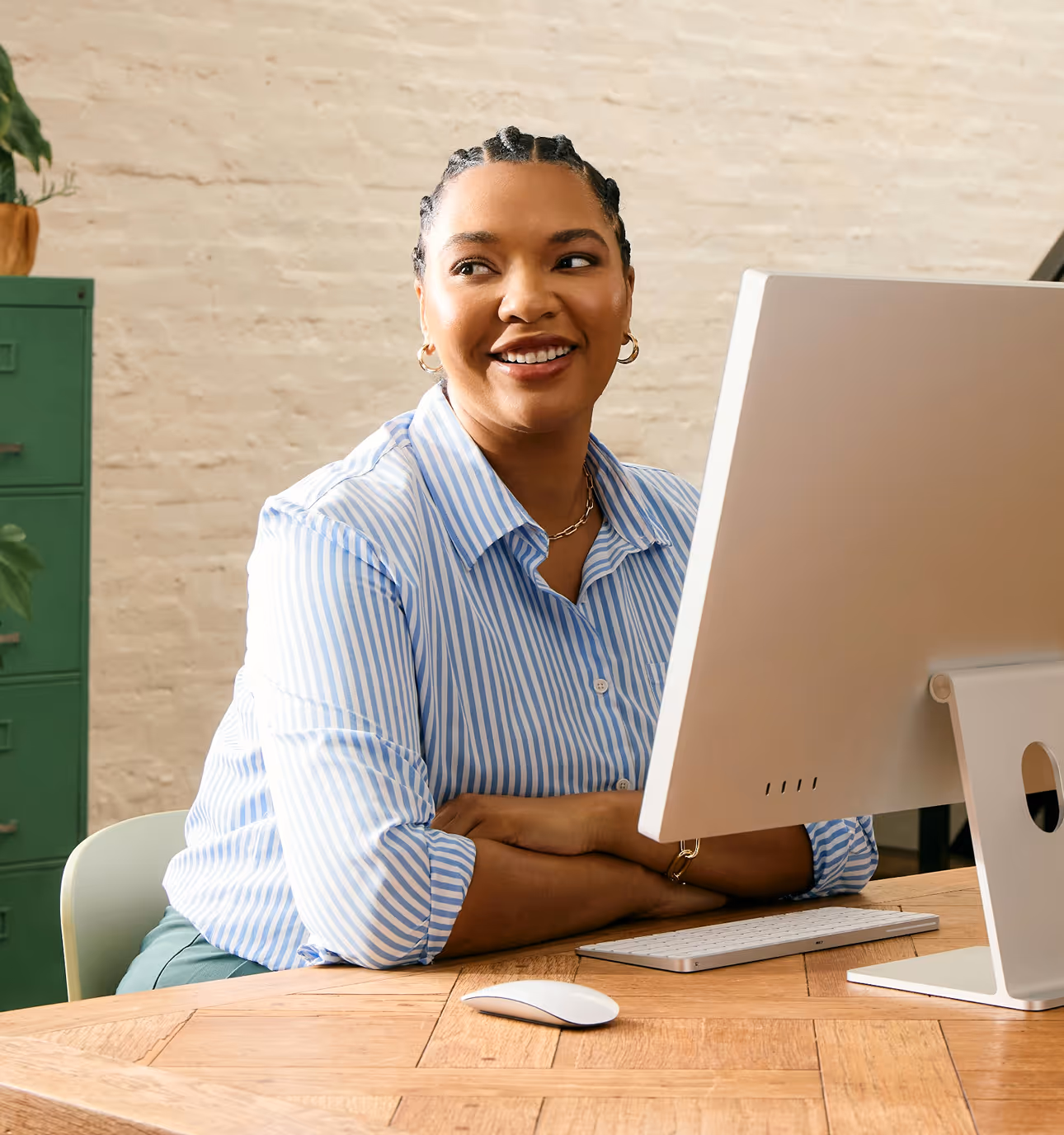 A focused professional working at a desk, embodying the disciplined approach BlackOrigin takes to building technology.